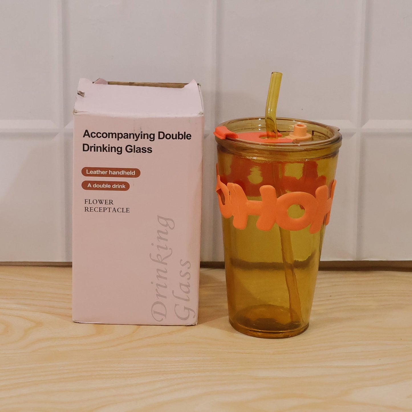 stylish glass tumbler with straw