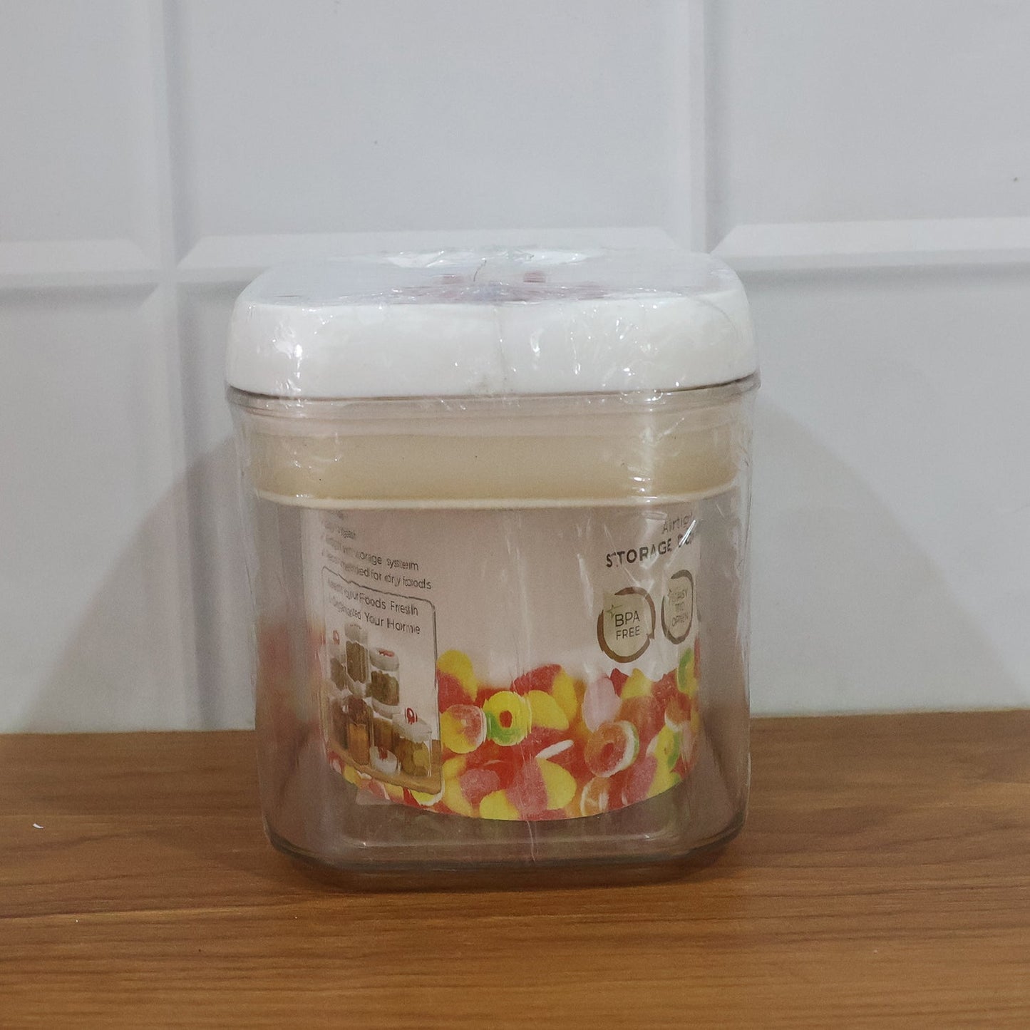 Transparent airtight jar with vibrant red lid