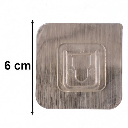 Transparent wall hook attached to smooth indoor surface