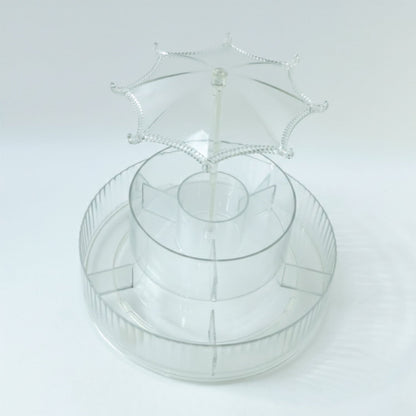 Spinning makeup and jewellery holder