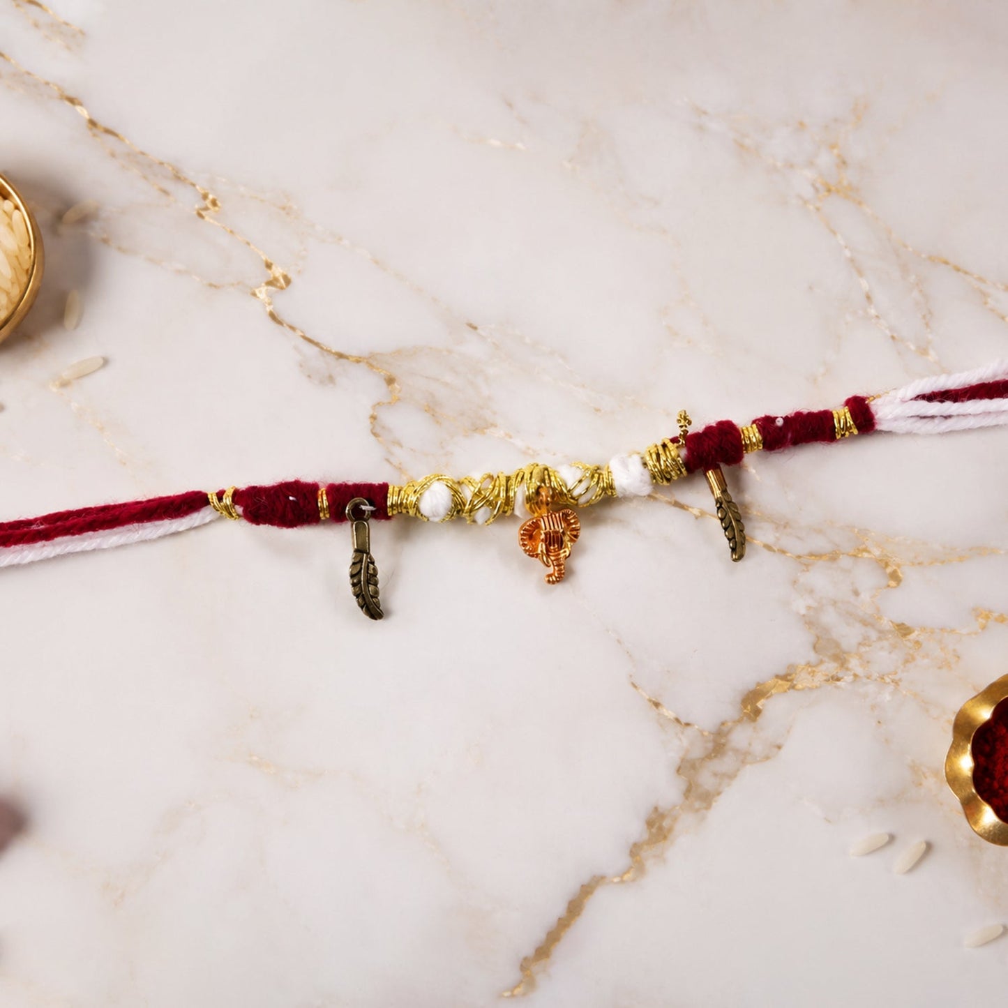 Decorative Thread Rakhi Bracelet with Ganesh & Feather Charms (1 Pc)
